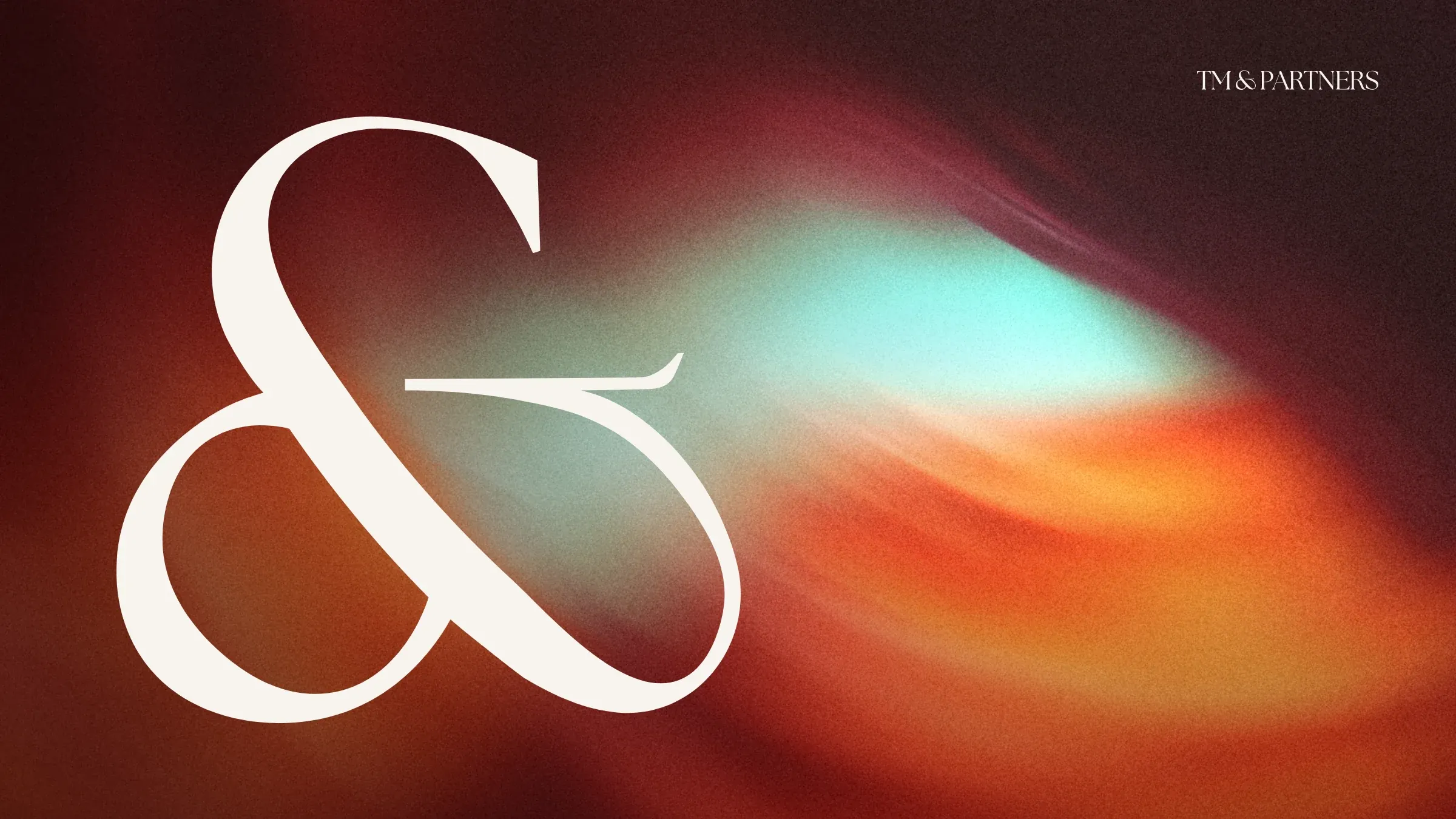 The TM & Partners ampersand in linen over the brand's glowing red texture