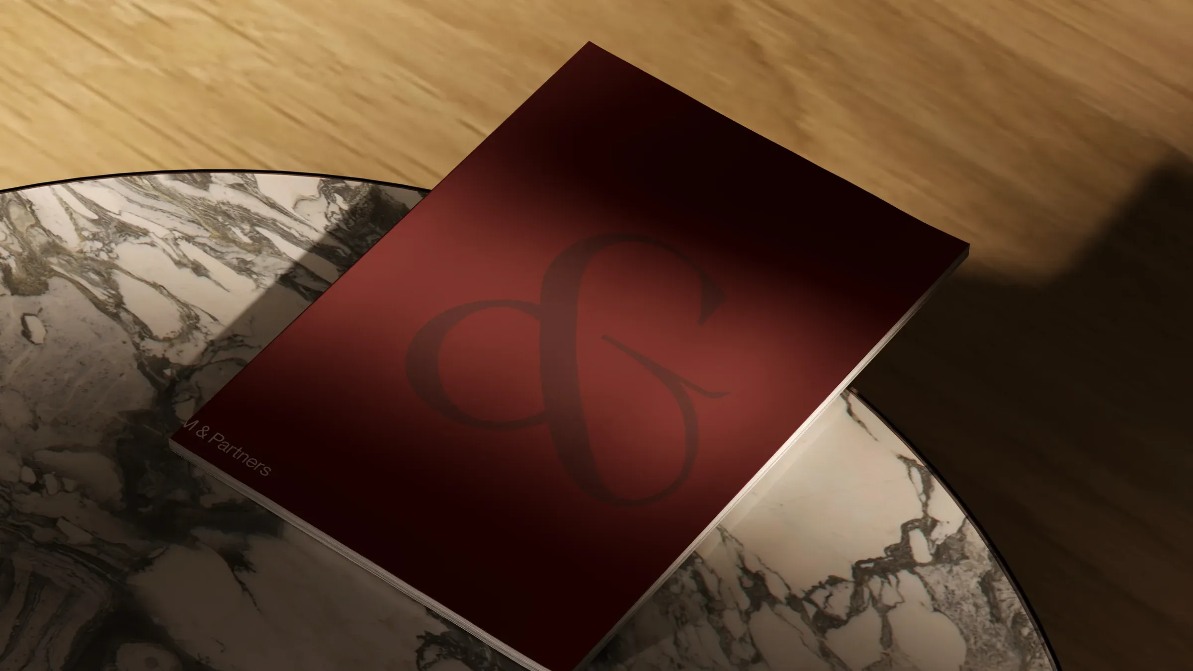 The brand book on a marble table
